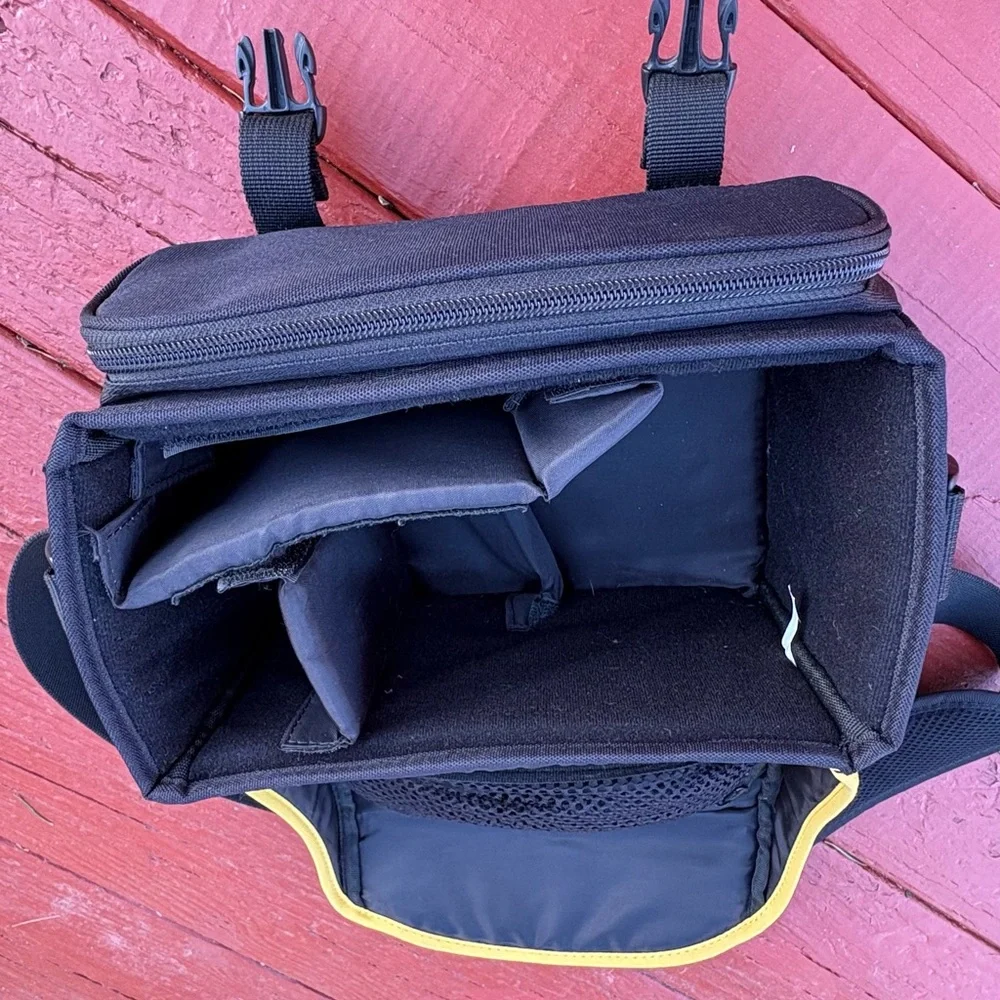 Nikon black camera and accessory shoulder carrying bag